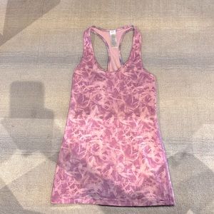 Great quality and Cheap!! Size 10 adorable purple tank top!